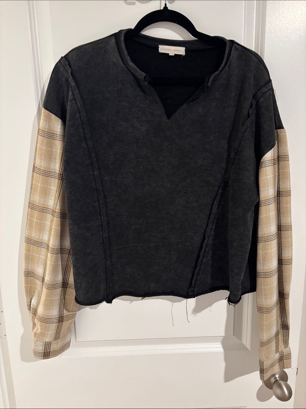 Black Pullover Sweatshirt with Beige Plaid Sleeves
